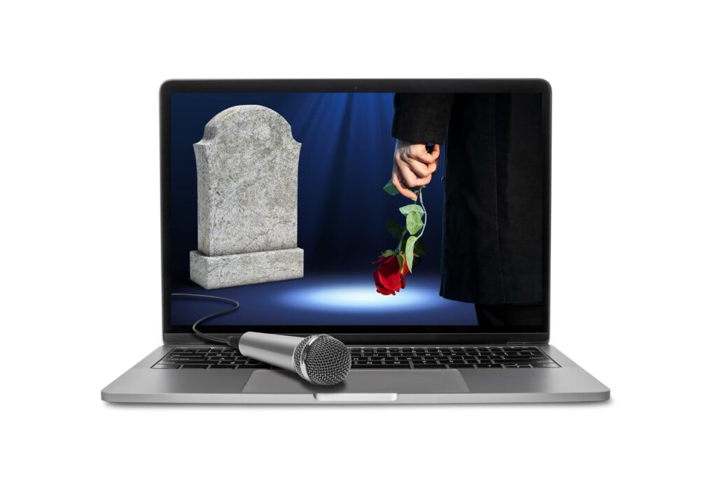 Ein Mikrofon auf einem Laptop, auf dessen Bildschirm ein Grabstein, eine rote Rose und ein trauernder Mensch zu sehen sind – sinnbildlich für eine Anleitung zur Trauerrede